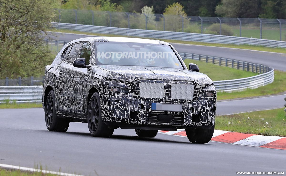 2023-bmw-x8-spy-shots--photo-credit-s-baldauf-sb-medien_100792343_h.jpg
