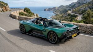 Aston Martin Valhalla Spider open-top hypercar parked on scenic coastal mountain road